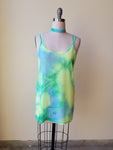 tie dye mesh minidress and choker on a dressform for rave clothing