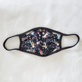 rave face mask with black earloops and printed PLUR main part