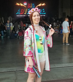 Girl at Music Festival with Mesh Jacket Bodysuit Fan Flower Crown Wearing Rainbow Embroidered Mesh Kimono for Rave or Music Festival with Pockets and Lining Trippy Acid Drip Design