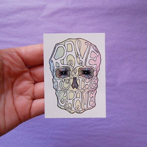 Pastel Rainbow Colored Skull Sticker with Rave to the Grave Text on Vinyl Sticker